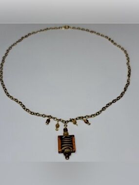 Hand Crafted Murono Glass focal bead Necklace with gold chain.